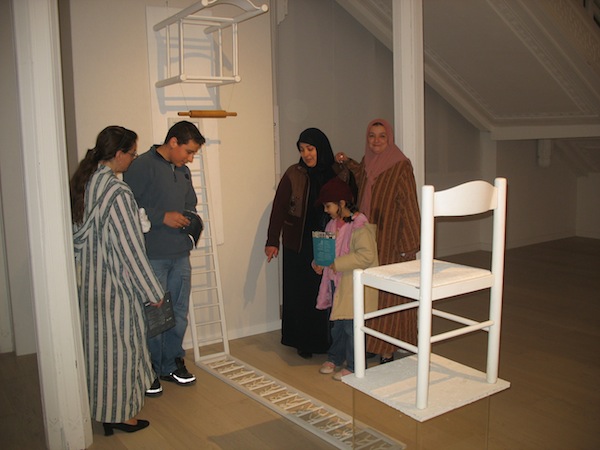 Anita Toutikian, Balance of Powers, 2004. Installation with wood, plexiglas, dough pin and dough men, iron scales. Variable dimensions. Photo taken at the Museum of Modern Art Algiers 2007