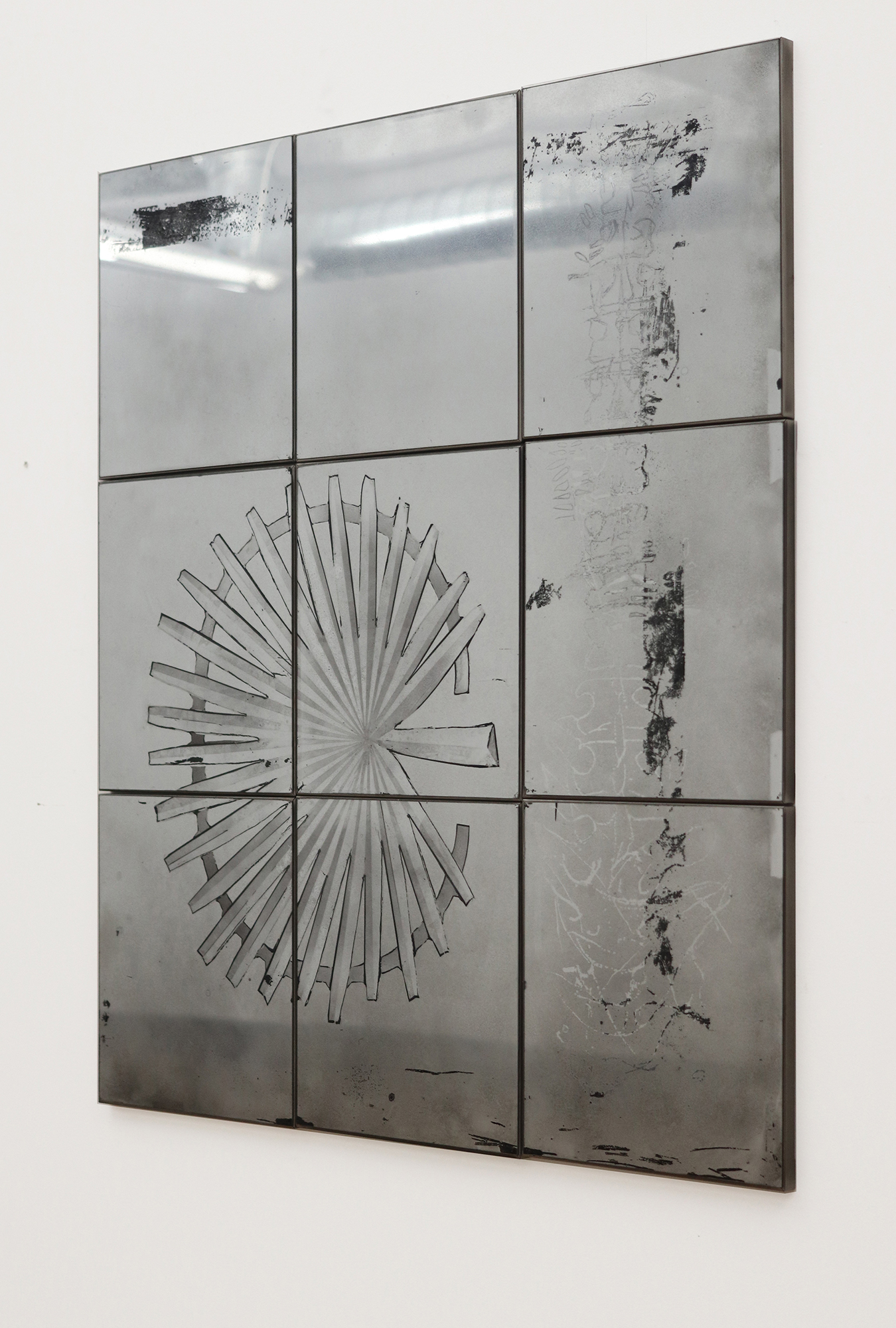 what is the trees were our Iungs No.1, 2021, Hand-painted liquid mirror and enamel on glass in aluminum frame, Nine  panels, overall 42 x 36 inches.
Image courtesy the artist and Marisa Newman Projects, NY.
