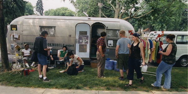 The BOOKMOBILE Project: Then, There, Now