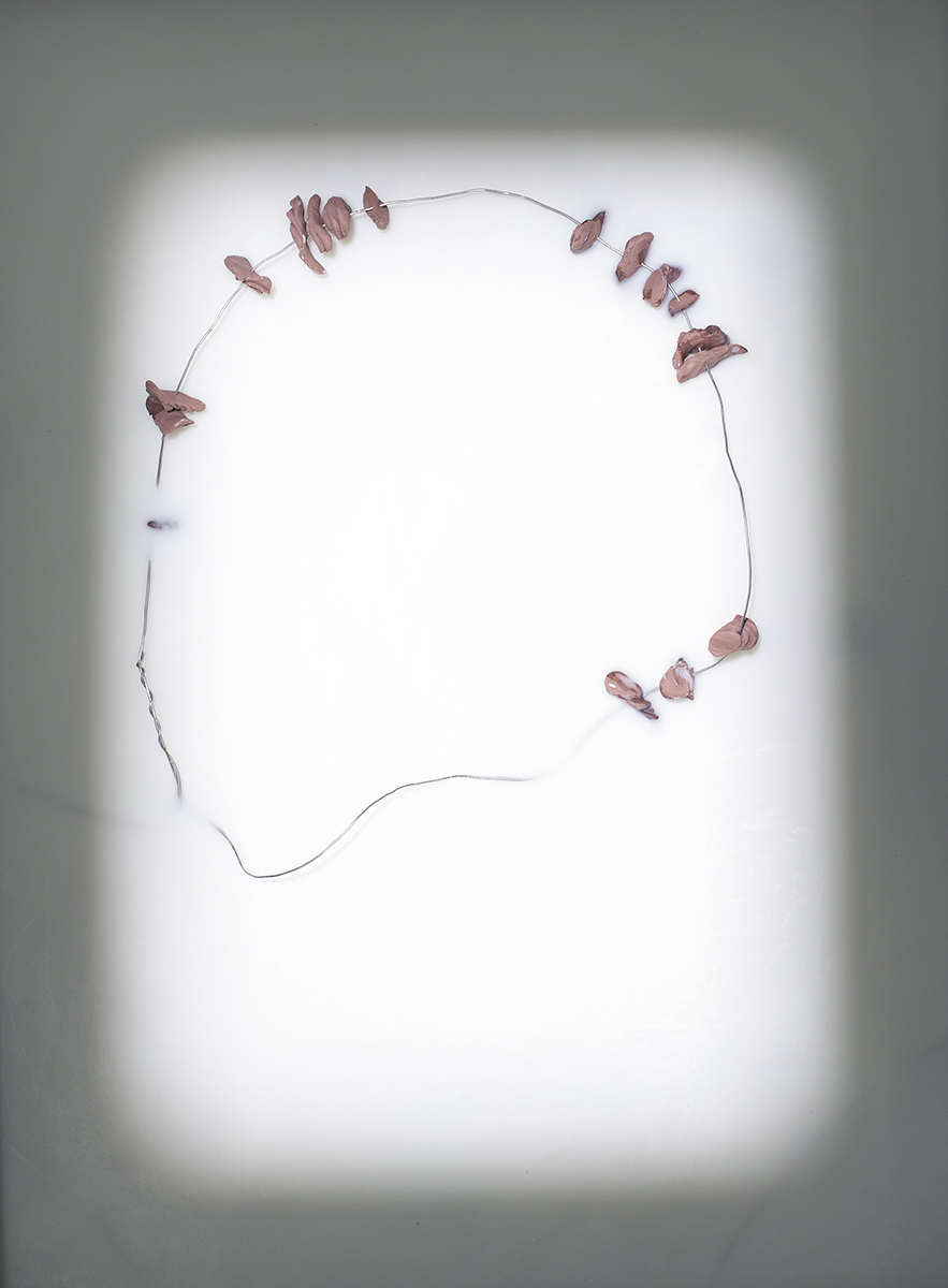 necklace for my grandmother malka (detail), 2018, wood, clay, wire, wax, kodak slide projector, 31 x 37 x 5 in.