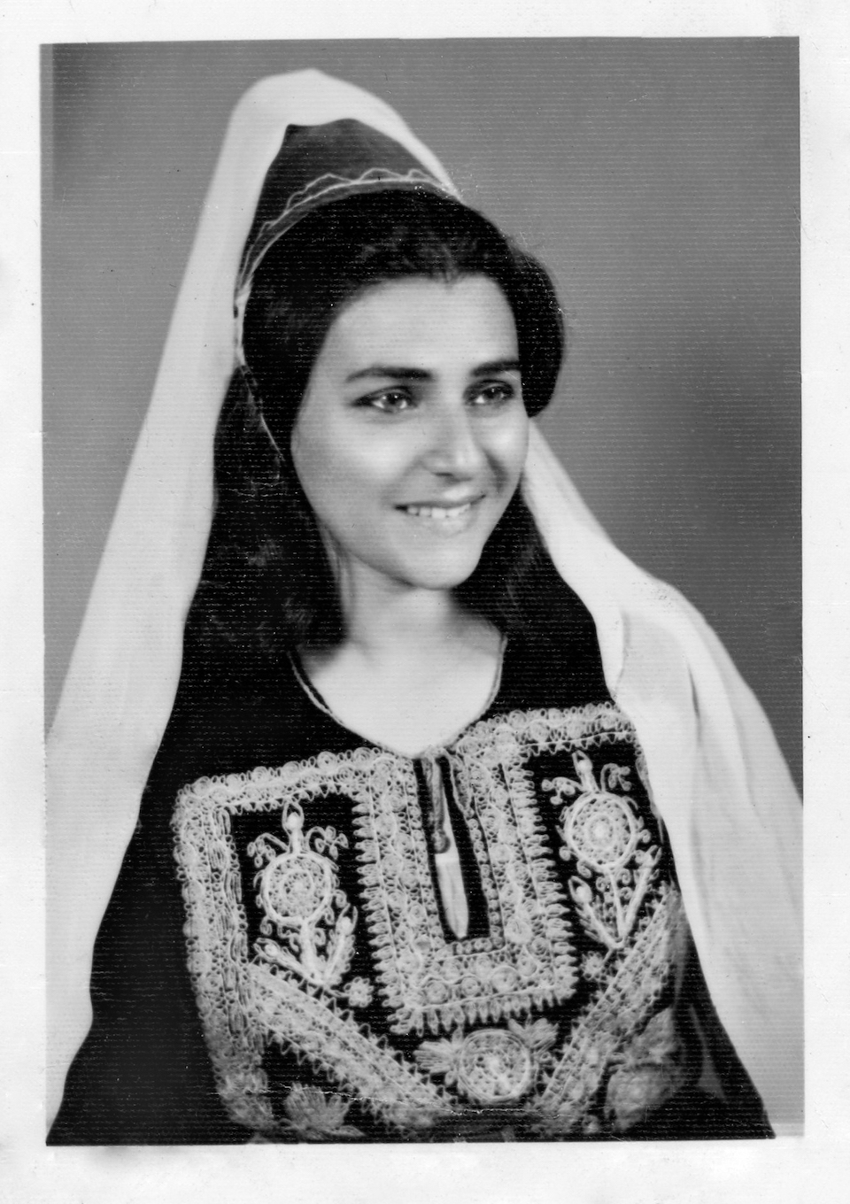 My grandmother posing for a portrait at the Varouj studio in Jerusalem on a day she felt beautiful, (original date unknown) (restored 2020), Black and white photo print