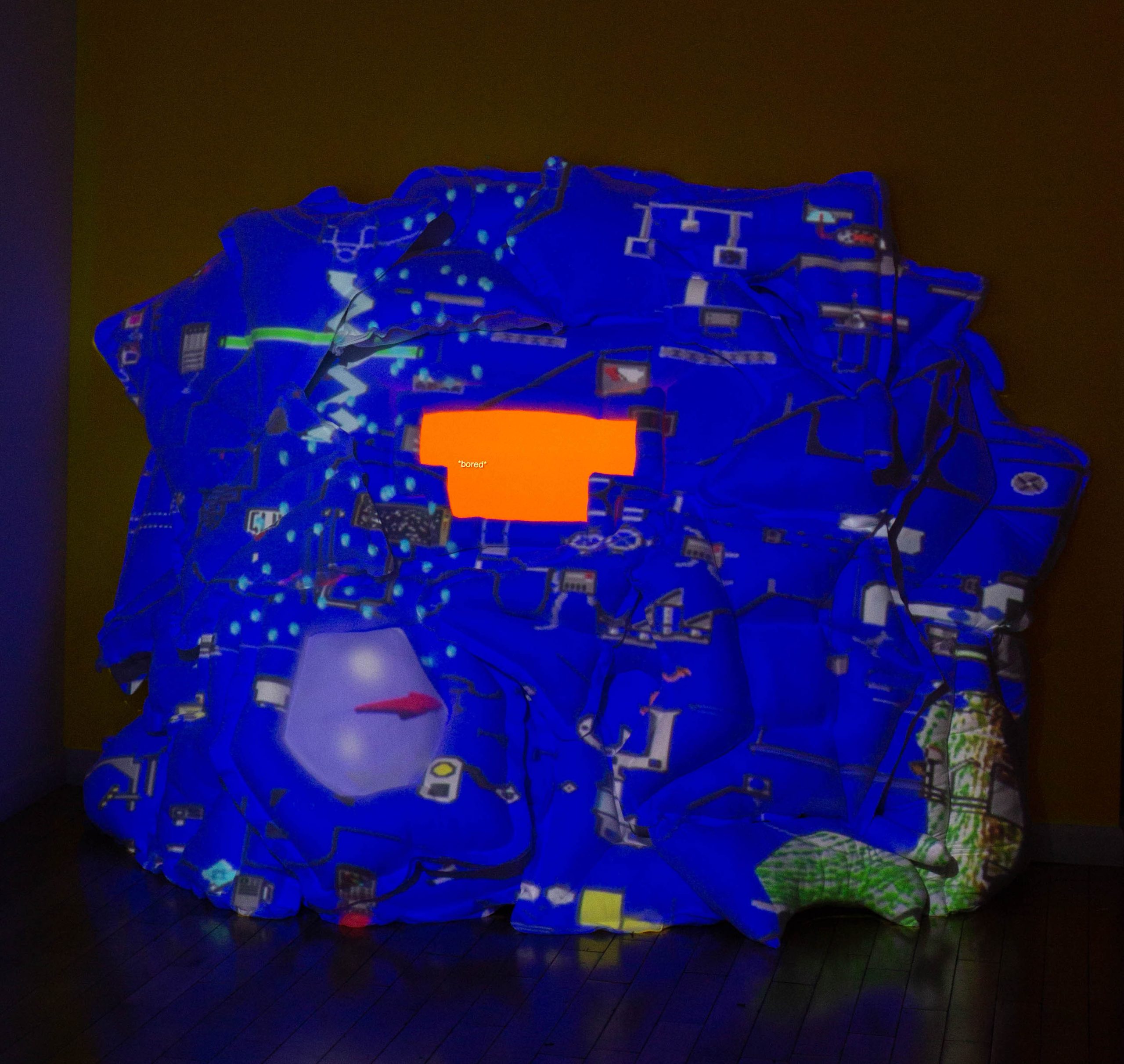 Soft Computing (Lurking Variable !=), 2020, Video Projection Mapping on Soft Sculpture, Embedded TV Screen, 4.5 x 9 x 2.5 ft 